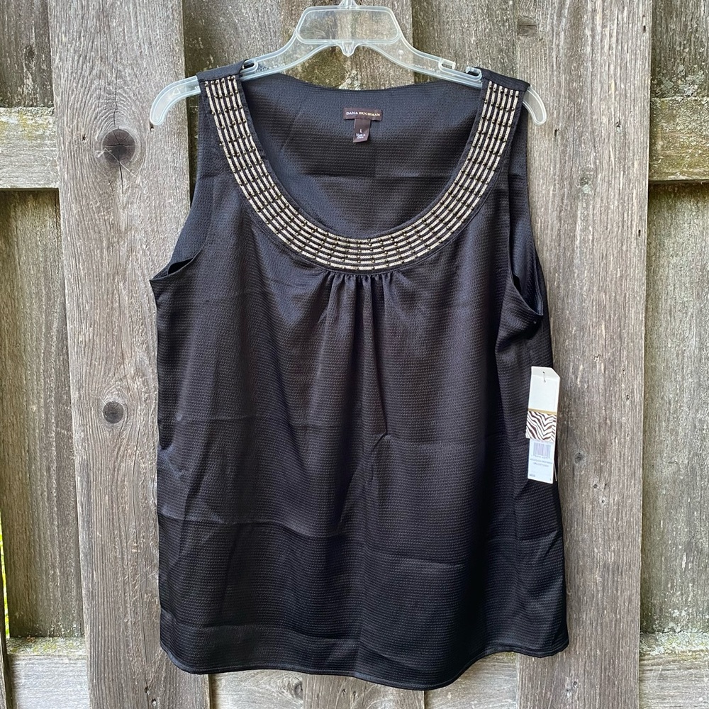 Black sleeveless blouse with beaded neck detail